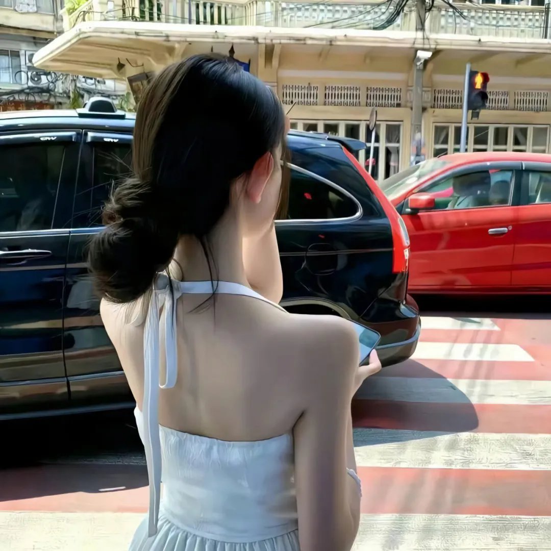 彼女